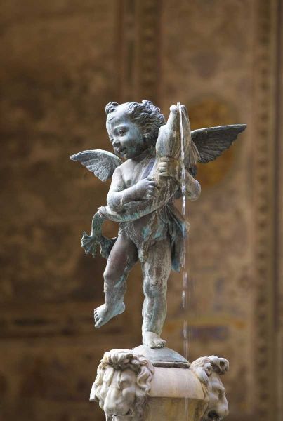 Italy, Florence Statue of boy with dolphin